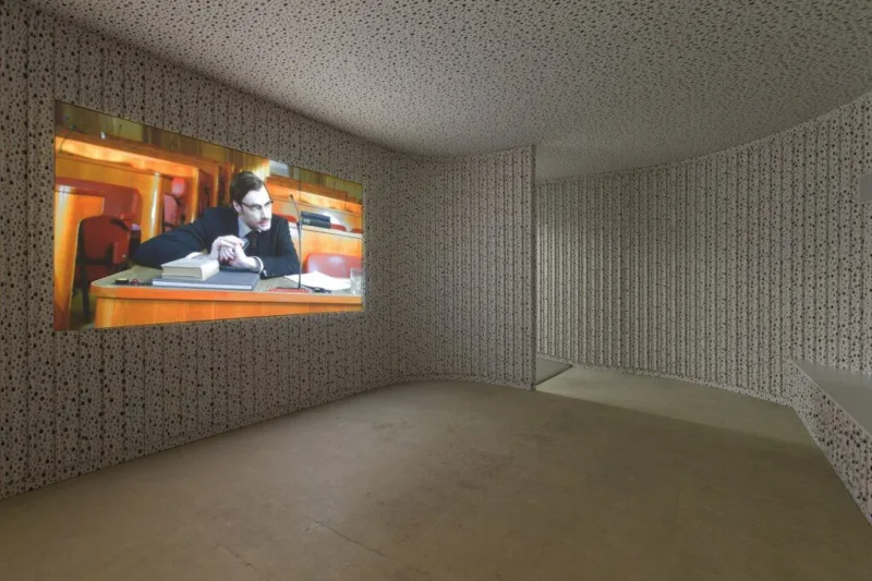 Installation view: Fruits of Our Land, HD projection, stereo sound, wood, wallpaper, For Our Economy and Culture, Pavilion of Slovenia, Venice Biennial