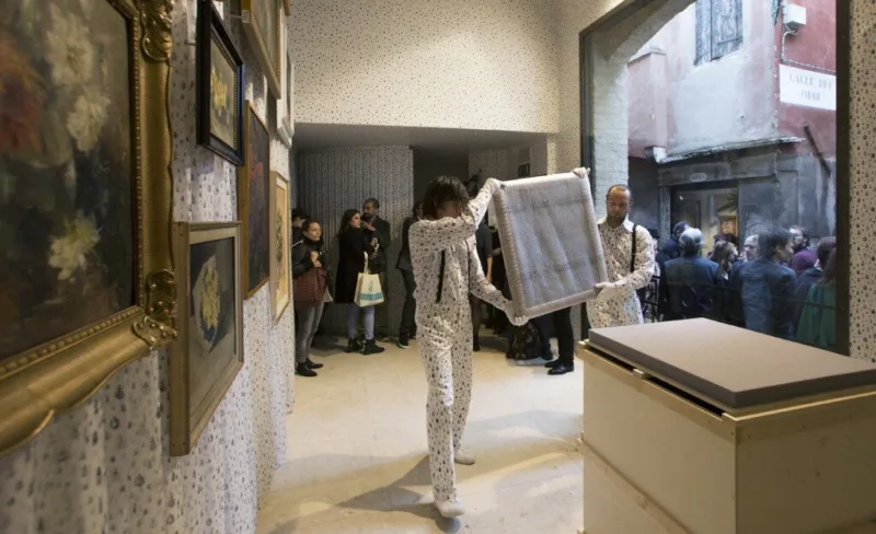 Installation view with performance We knew it would be hard to put anything on these walls, For Our Economy and Culture, Pavilion of Slovenia, Venice Biennial