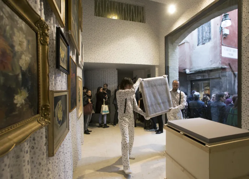 Installation view with performance We knew it would be hard to put anything on these walls, For Our Economy and Culture, Pavilion of Slovenia, Venice Biennial