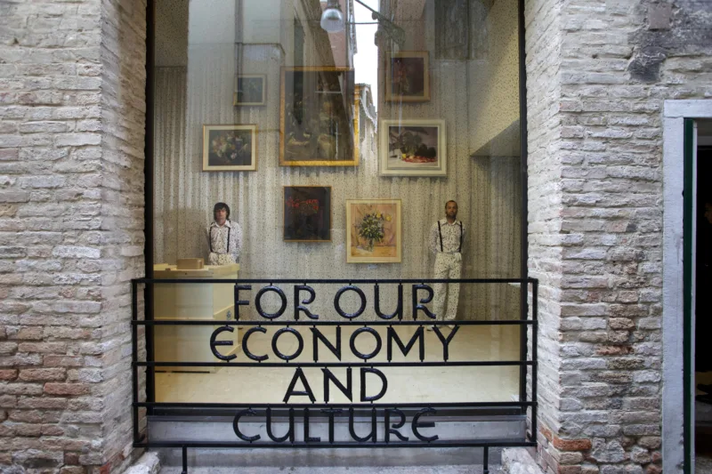 Installation view with performance We knew it would be hard to put anything on these walls, For Our Economy and Culture, Pavilion of Slovenia, Venice Biennial